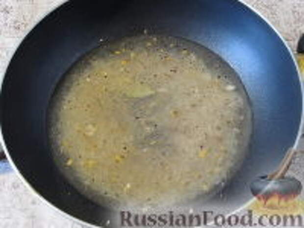 Фото приготовления рецепта: Пряный рис с изюмом и миндалем - шаг №6