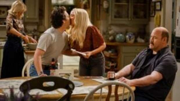 Georgie and Mandy kiss while Jim looks away on Georgie & Mandy's First Marriage Season 1 Episode 18