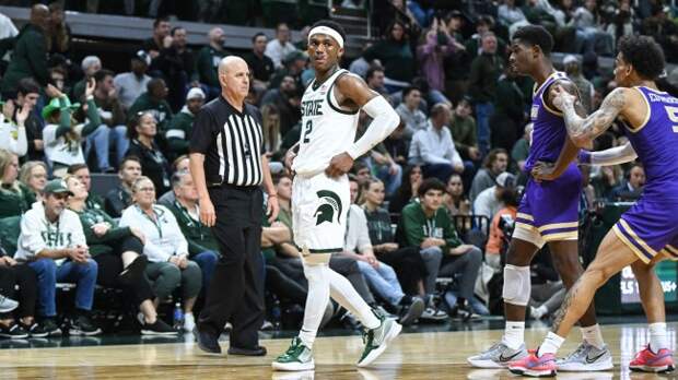 Tyson Walker walks on the court during a game against James Madison.