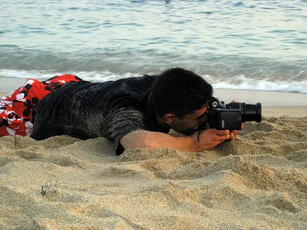 Пляжный фотограф.