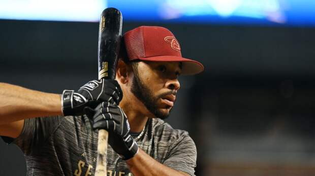 Tommy Pham warms up before a game against the Padres.