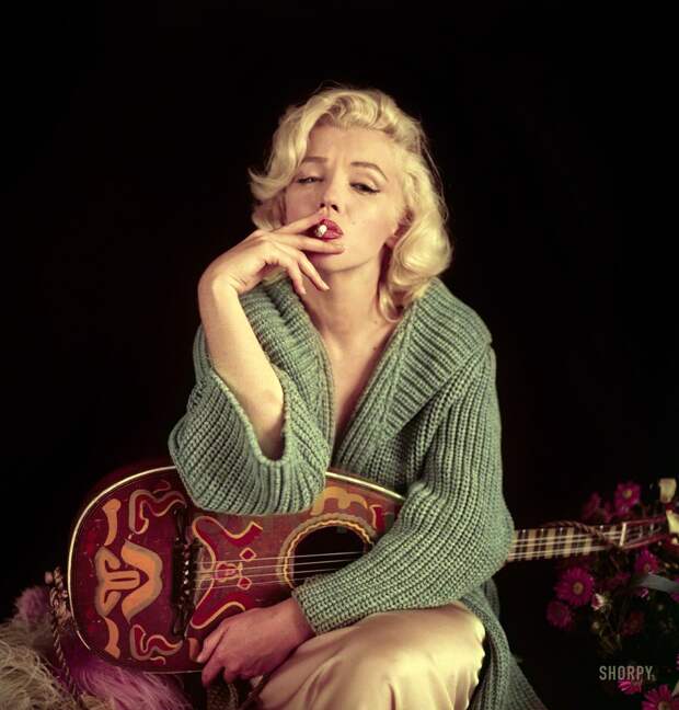 September 2, 1953. Los Angeles, California. Marilyn Monroe with mandolin.