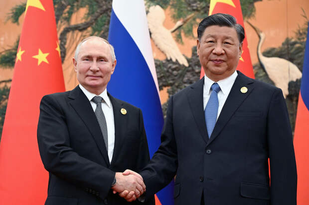 Ушаков: визит Путина в Китай отражает личную химию между ним и Си Цзиньпином