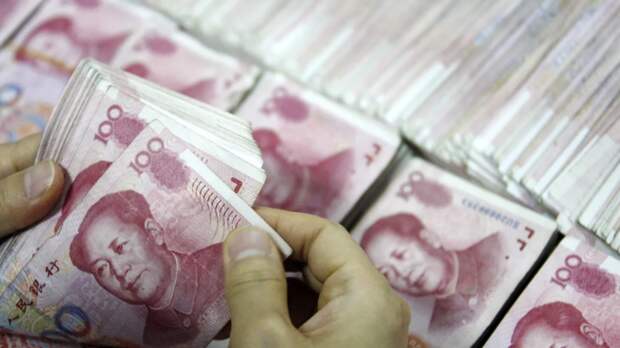Курс юаня на Мосбирже опустился ниже 12 рублей