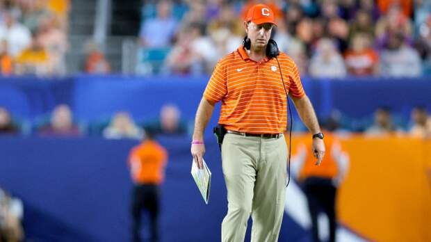 Dabo Swinney walks the sidelines in Clemson's bowl game vs. Tennessee.