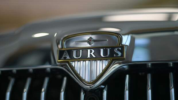 Автомобиль Aurus Senat в первом шоуруме по коммерческим продажам отечественных машин для первых лиц государства проекта Кортеж в деловом центре Москва-Сити Автомобиль Aurus Senat в первом шоуруме по коммерческим продажам отечественных машин для первых лиц государства проекта Кортеж в деловом центре Москва-Сити - РИА Новости, 1920, 13.06.2021