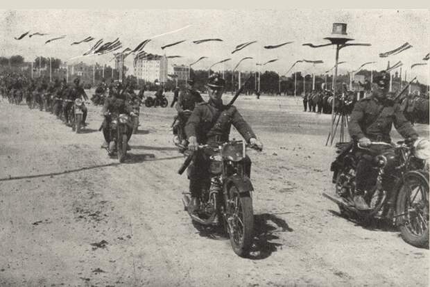 Photo: Wikimedia. Members of the Aizsargi on bikes during a parade, 1939.