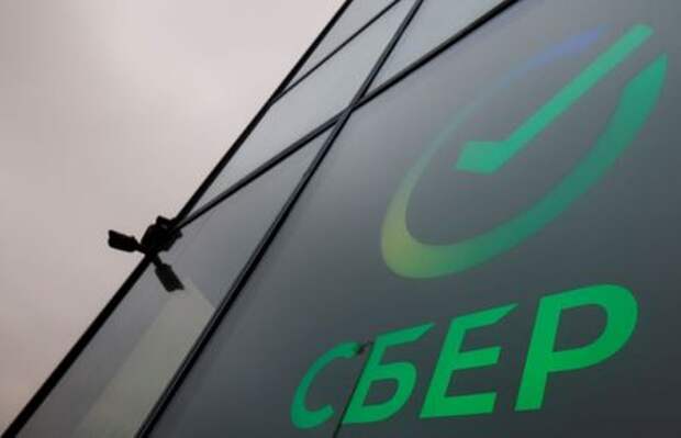 The logo is on display in an office of the Russian largest lender Sberbank in Moscow, Russia December 24, 2020. Picture taken December 24, 2020. REUTERS/Maxim Shemetov