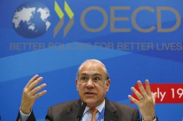 Angel Gurria, secretary-general of the Organisation for Economic Co-operation and Development (OECD), gestures during a news conference, part of the G20 finance ministers and central bank governors' meeting, in Moscow, July 19, 2013.  REUTERS/Grigory Dukor