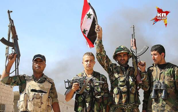 Бойцы сирийской армии в освобожденном городе Ачан. Фото: Александр КОЦ