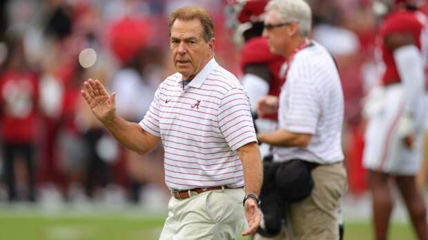 Nick Saban on the field before Alabama's game vs. Texas.