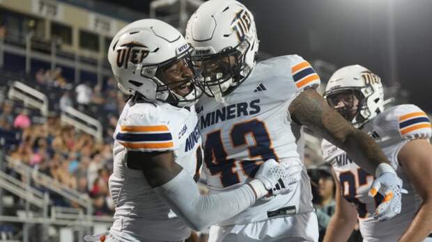 UTEP players celebrate a big play against FIU.