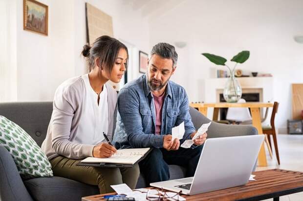 Couple working on taxes.