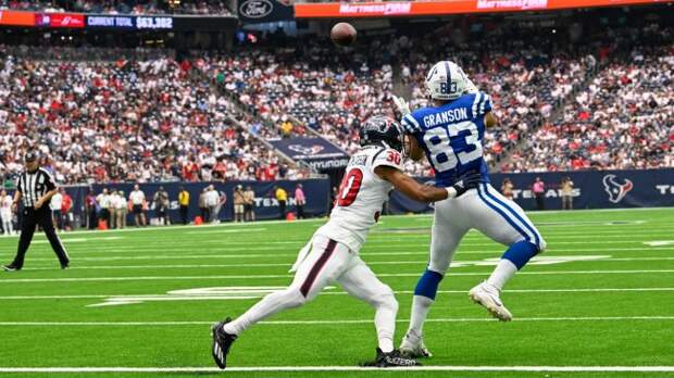 Kylen Granson hauls in a touchdown pass against the Texans.
