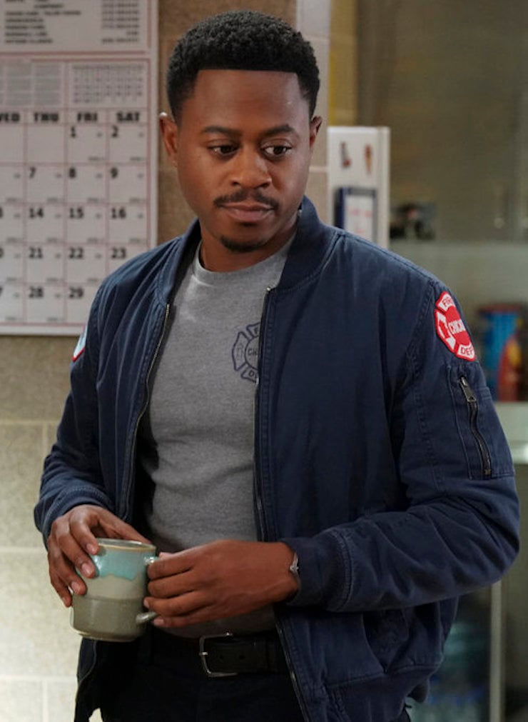 Ritter holds a cup of coffee at the station.