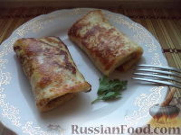 Фото к рецепту: Блинчики с мясом, капустой и луком
