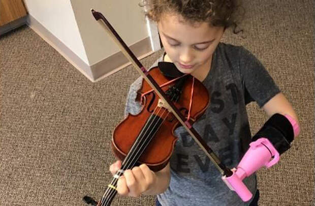 engineering student makes device for one handed girl violin