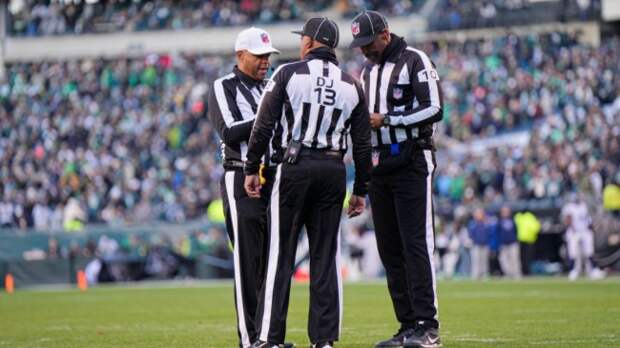 NFL refs huddling