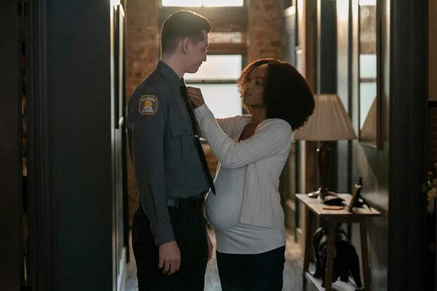 Becky adjusts Eli's tie for him on Law & Order: Organized Crime Season 5 Episode 1