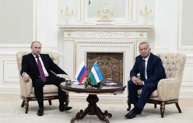 Президент России Владимир Путин и президент Узбекистана Ислам Каримов (слева направо)