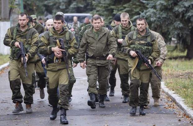Prime Minister of the self-proclaimed Donetsk People's Republic Alexander Zakharchenko walks to meet local residents during his election campaign tour to the southern coastal town of Novoazovsk