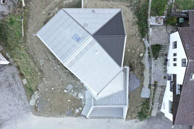Дом необычной пятиугольной формы в Швейцарии