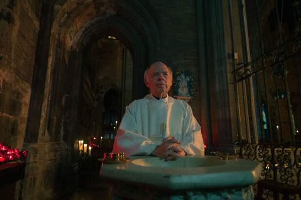 Father Ignatius at a baptismal