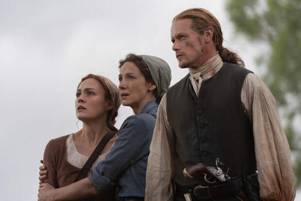 Sophie Skelton, Caitriona Balfe and Sam Heughan, Outlander | Photo Credits: Robert Wilson/Starz