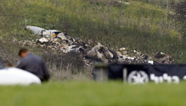 На месте крушения израильского истребителя F-16, участвовавшего в налете на Сирию. Архивное фото
