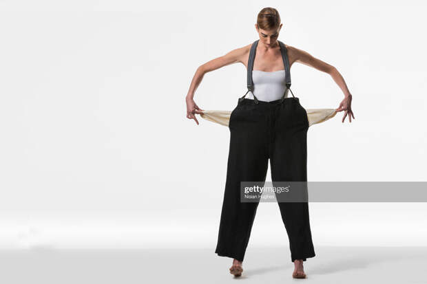 Woman Showing Empty Pockets
