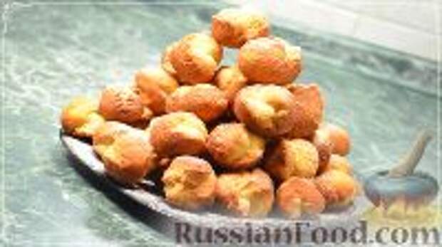 Фото к рецепту: Пончики на сгущёнке