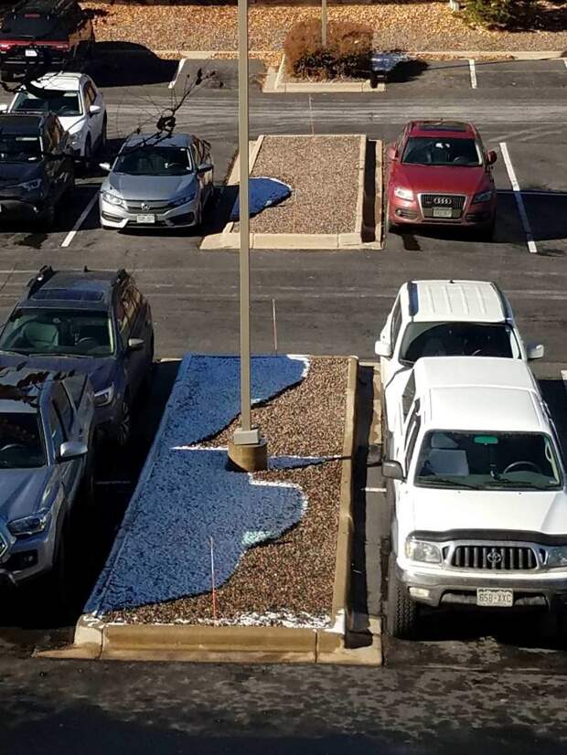 Car Shadows Preventing Snow From Melting At My Office