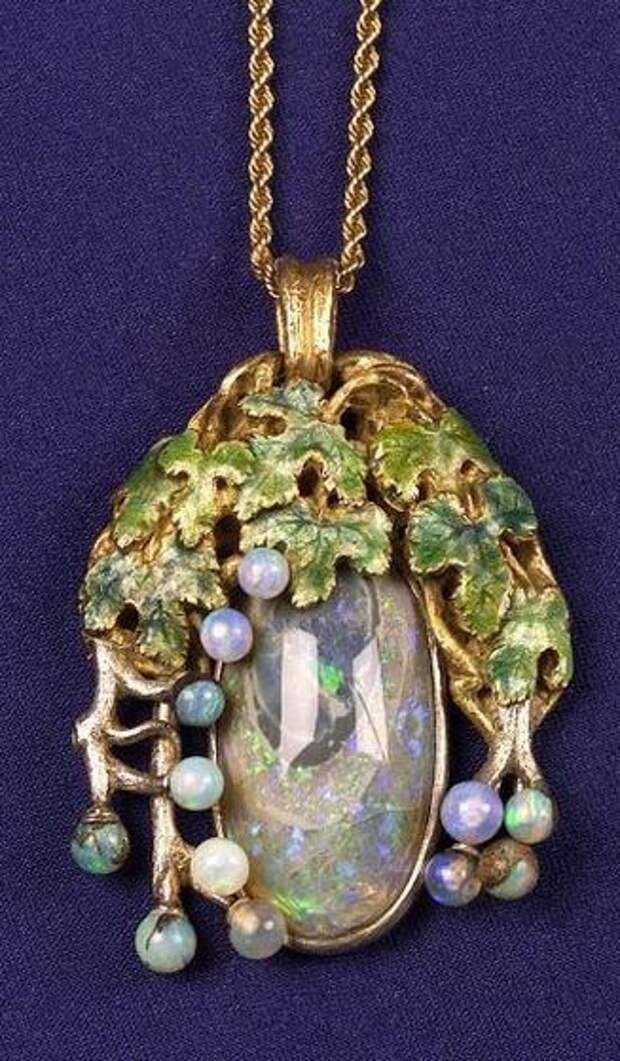 Black Opal, Opaline and Enamel Pendant, Tiffany & Co., c. 1905,the black opal among opaline grapes, vines and enamel leaves, 18kt gold and platinum mount, signed.