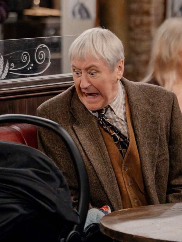 Alan hisses at a baby in the bar