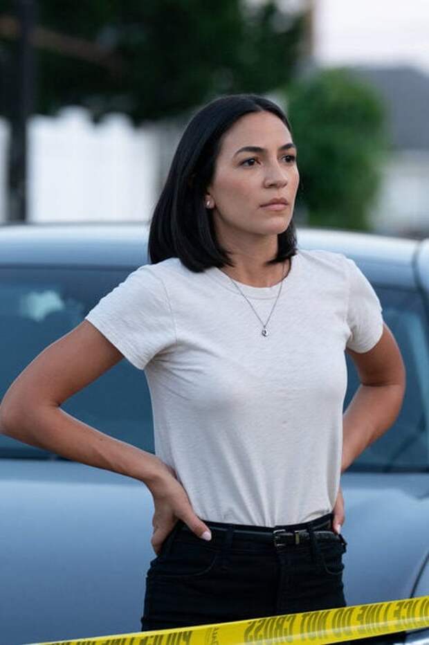 Val Soto behind crime scene tape during Chicago PD Season 12 Episode 3.