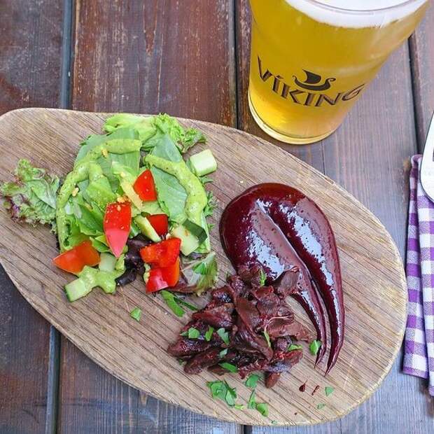 Smoked puffin with blueberry sauce.