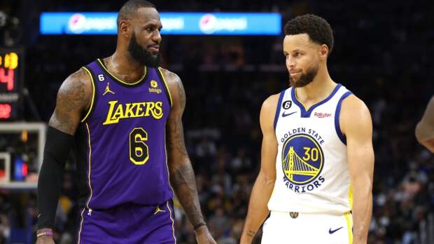 Steph Curry and LeBron James face off on the basketball court.
