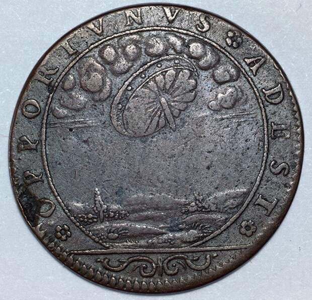 Эта монета с изображением диска, похожего на НЛО, была отчеканена во Франции в 1680 году. Что хотел сказать автор этим изображением, никто объяснить не может археология, загадки, нло, предки, рисунки, тайны, ученые, фрески