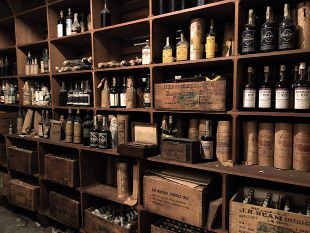 Bottles upon bottles of whiskey, neatly organized and hidden for a century.
