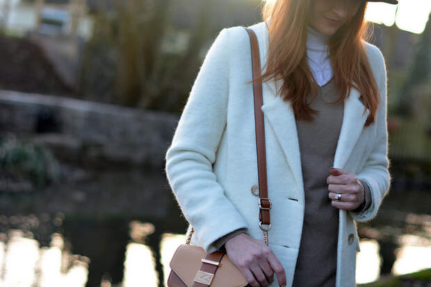 Winter white coat, fedora and roll neck