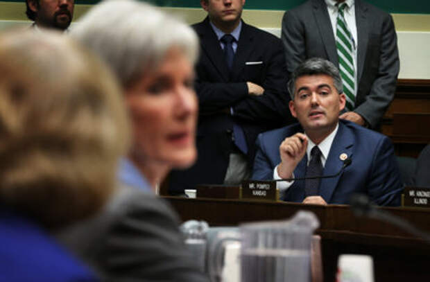 U.S. Rep. Cory Gardner, R-Colo., (right) questions Health and Human Services Secretary Kathleen Sebelius (left) as she turns around to her aides during the House Energy and Commerce Committee hearing about the troubled launch of the Healthcare.gov website on Oct. 30, 2013, in Washington, D.C. (Alex Wong/Getty Images)