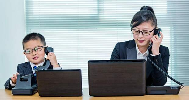 kid mimicking an adult