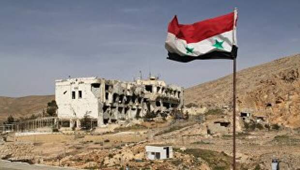 Разрушенное здание в Сирии. архивное фото