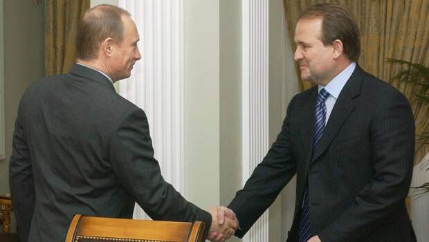 Владимир Путин и экс-глава администрации президента Украины Виктор Медведчук.