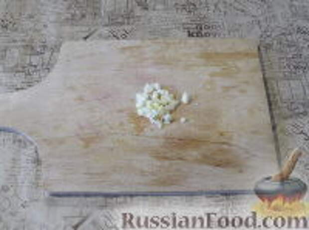 Фото приготовления рецепта: Пряный рис с изюмом и миндалем - шаг №2