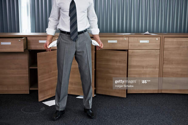 Businessman with empty pockets Businessman with empty pockets