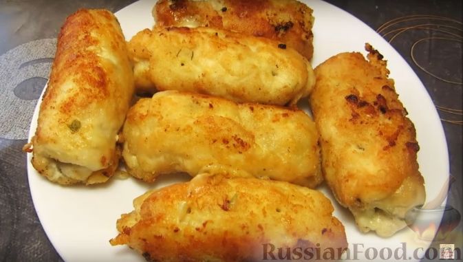 Фото к рецепту: Куриные рулетики с сыром