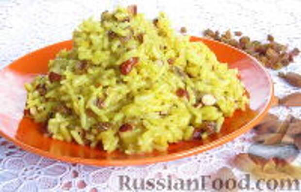 Фото приготовления рецепта: Пряный рис с изюмом и миндалем - шаг №12