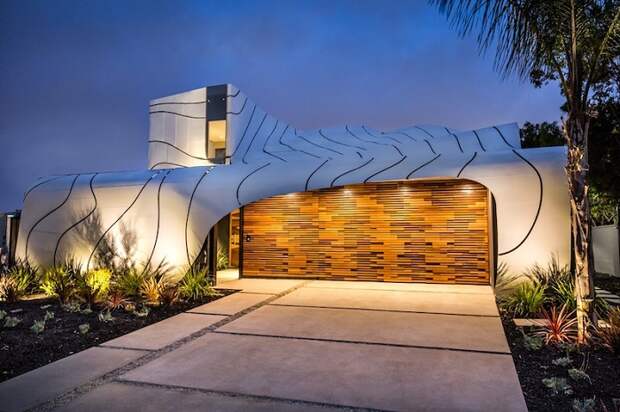 Wave House - частный особняк с эффектным волнообразным фасадом.