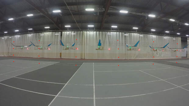 a composite photo showing the new aircraft flying across a warehouse